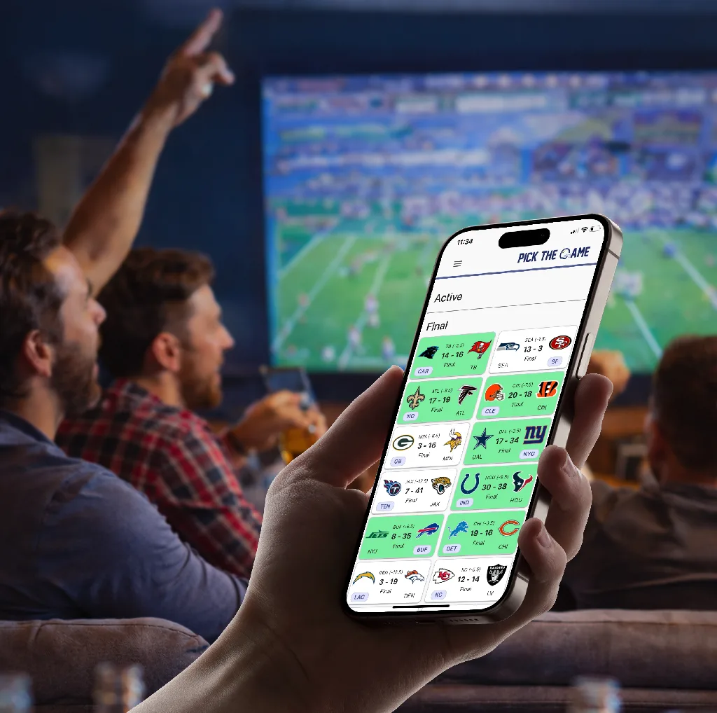 A football fan checking PickTheGame during a game